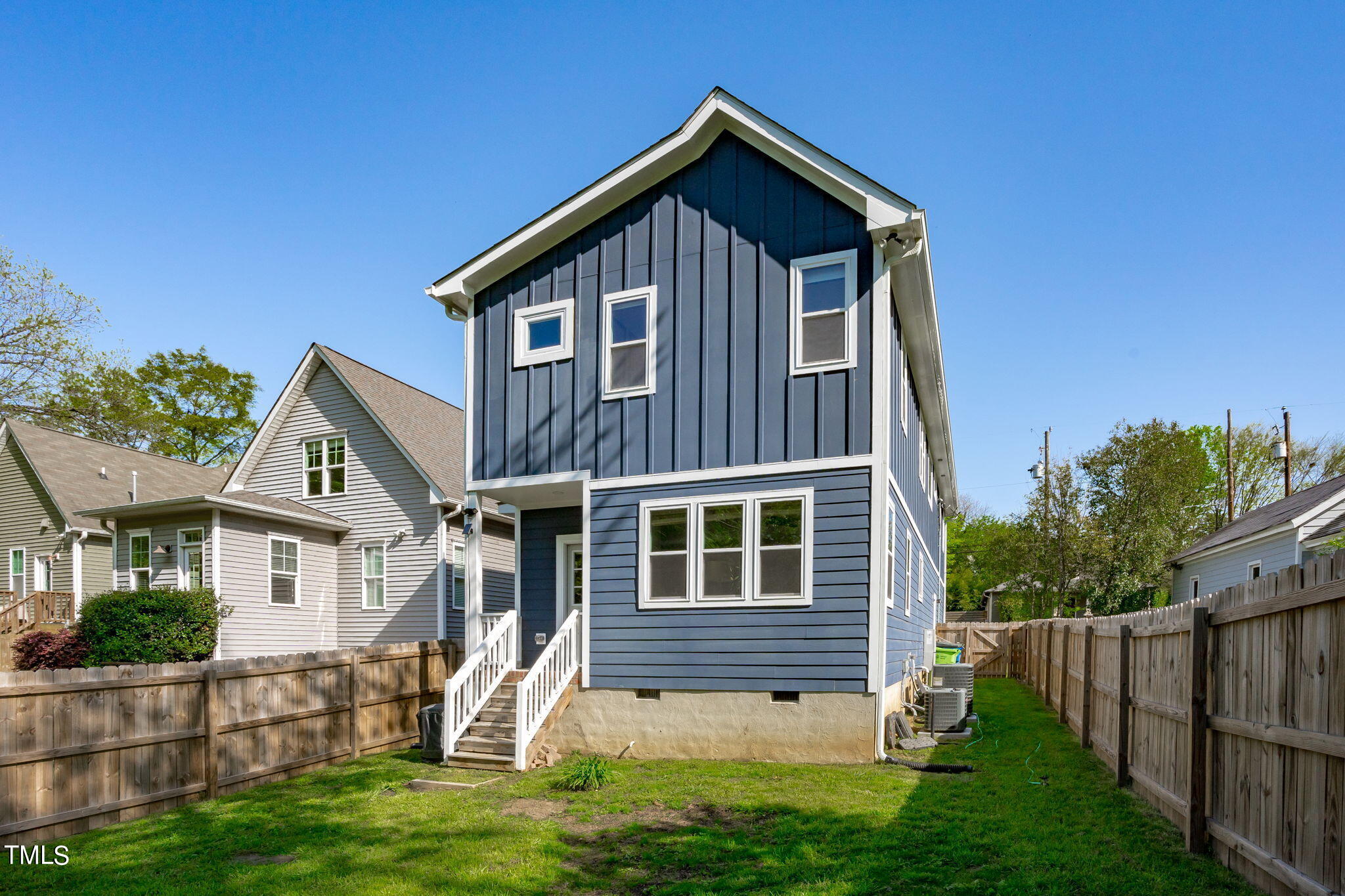 312 East Lee Street Raleigh, NC 27601 - Photo 46 of 48 a front view of a house with a yard