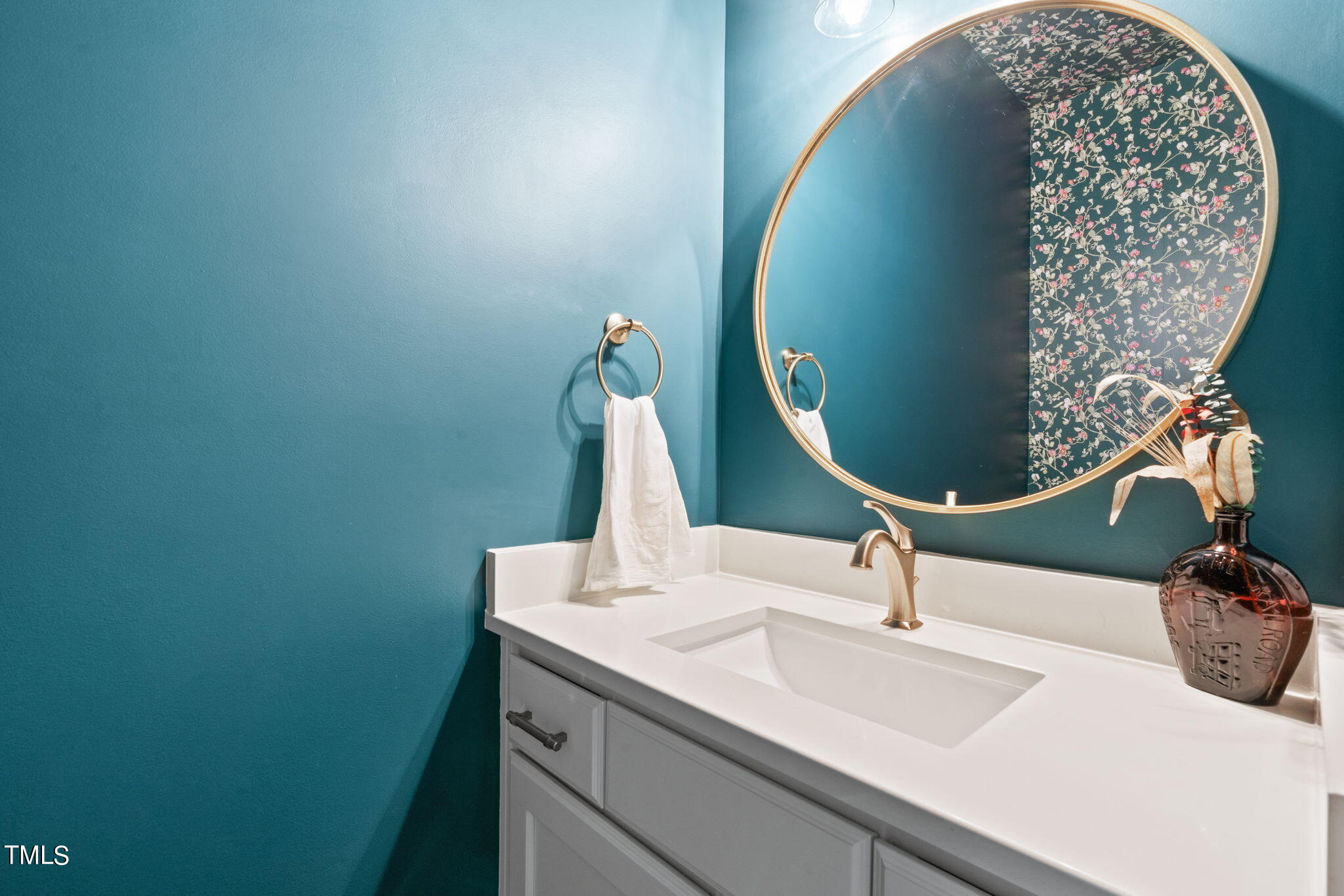 312 East Lee Street Raleigh, NC 27601 - Photo 8 of 48 a bathroom with a sink and a mirror
