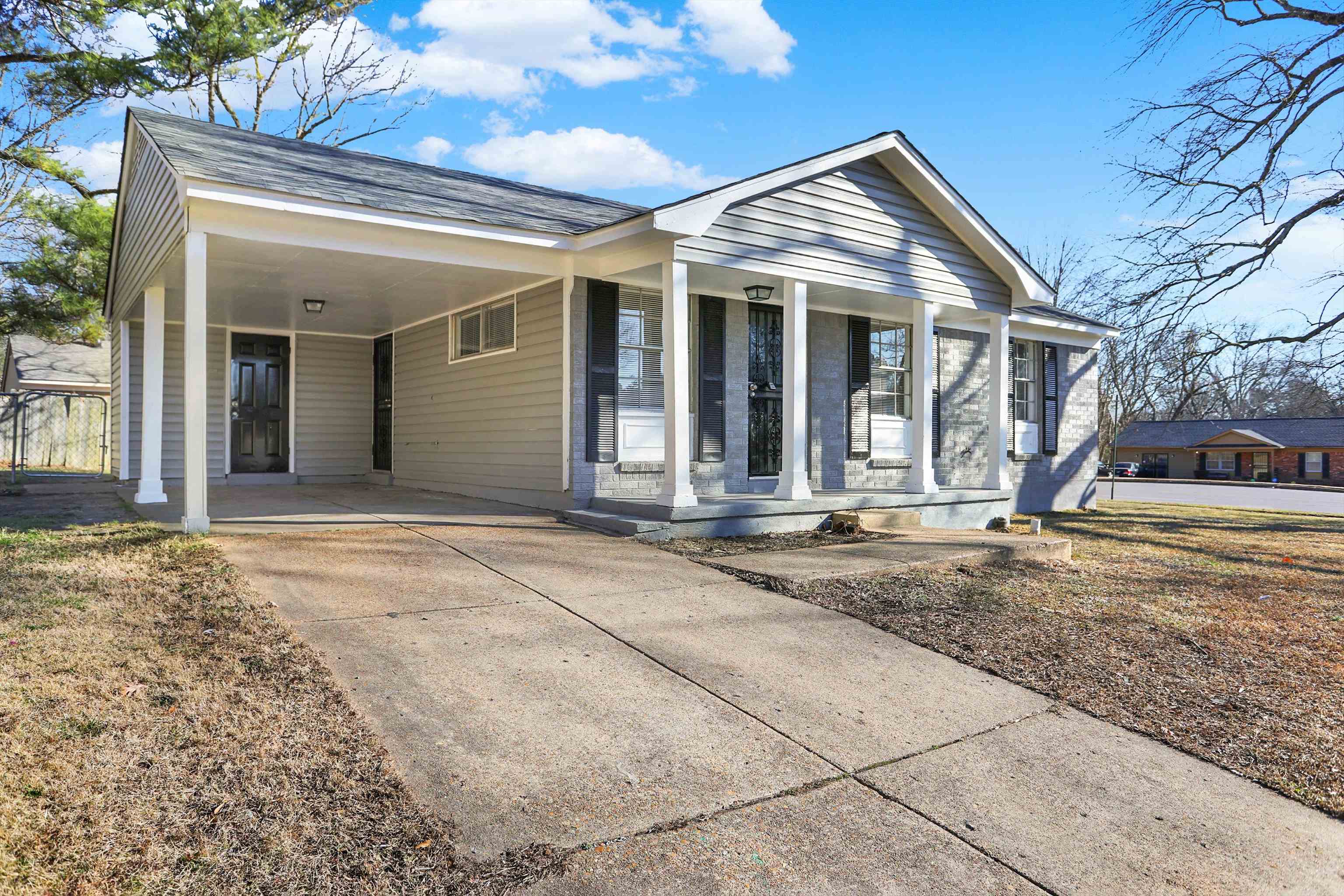3716 Ridgemont Road Memphis, TN 38128 - Photo 2 of 30 front view of a house with a yard