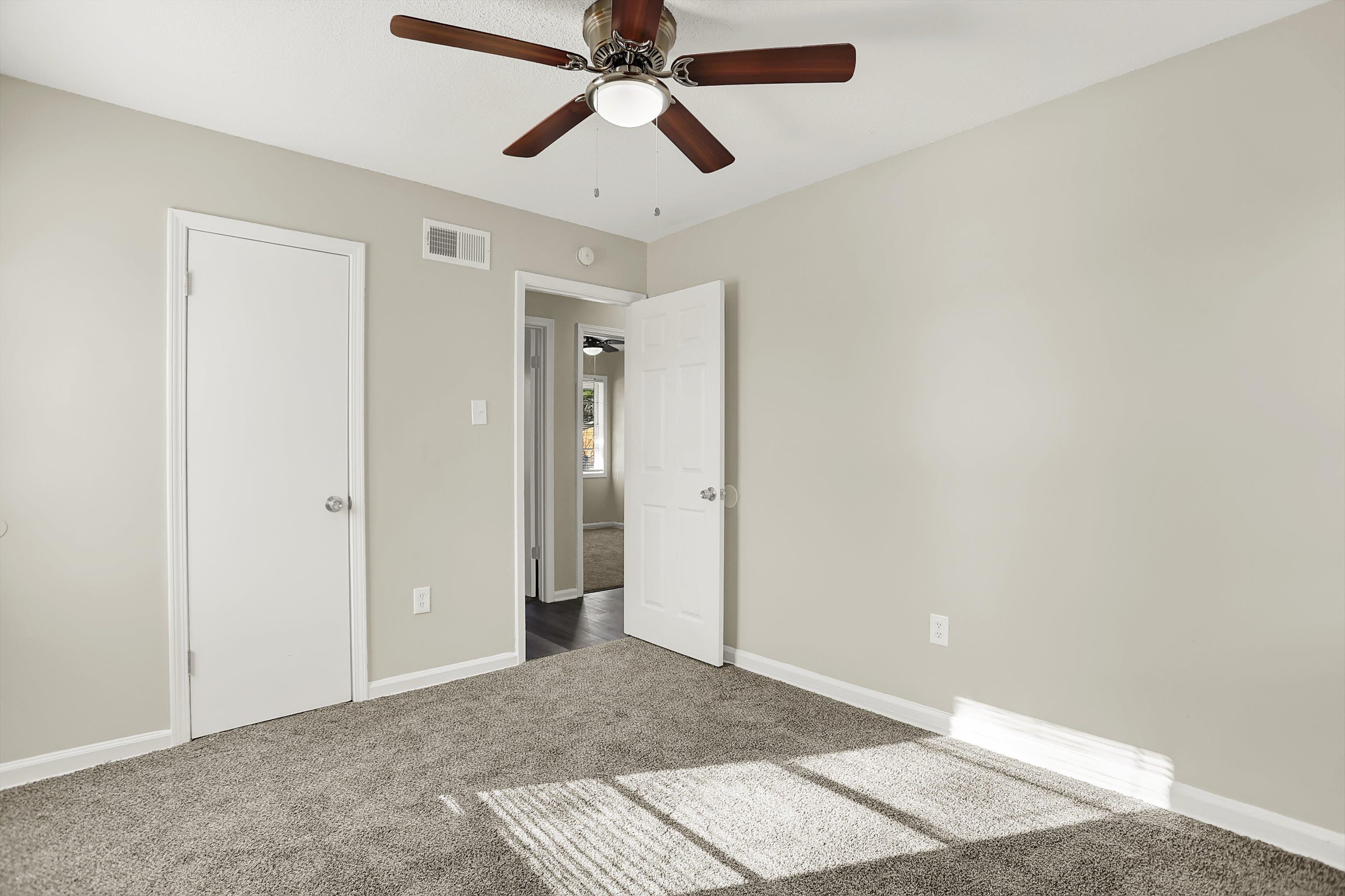 3716 Ridgemont Road Memphis, TN 38128 - Photo 26 of 30 a view of a room that has a fan and a chandelier fan