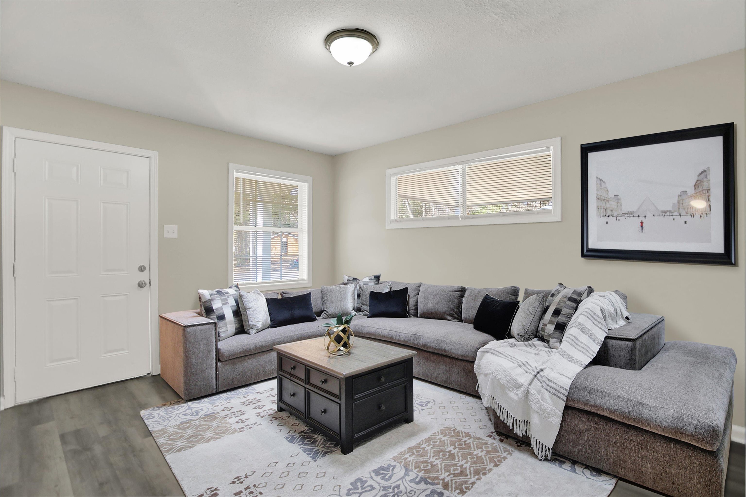 3716 Ridgemont Road Memphis, TN 38128 - Photo 6 of 30 a living room with furniture and a window