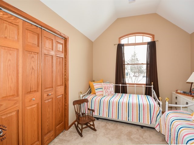 312 Main Street Oswego, IL 60543 - Photo 19 of 29 a bedroom with a bed and a window