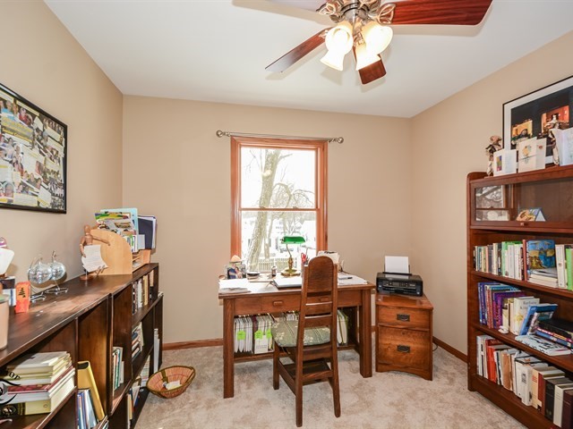 312 Main Street Oswego, IL 60543 - Photo 21 of 29 a view of a workspace with furniture and a window