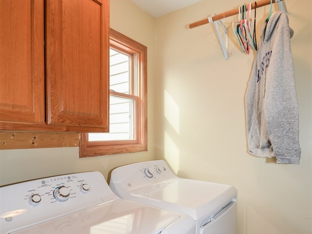 312 Main Street Oswego, IL 60543 - Photo 23 of 29 a bathroom with a bathtub and a window