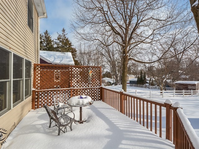 312 Main Street Oswego, IL 60543 - Photo 26 of 29 a view of a chairs and table in backyard