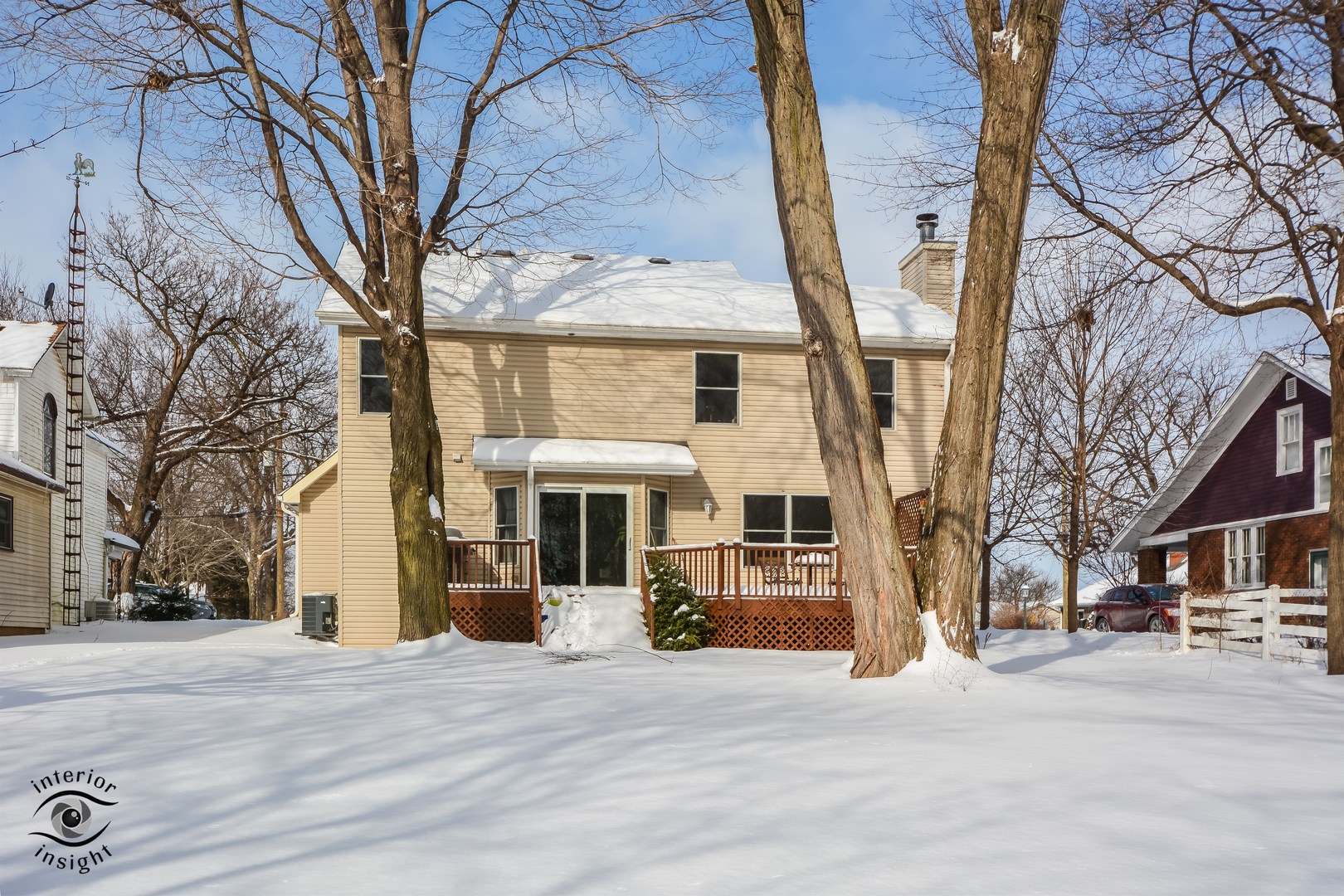 312 Main Street Oswego, IL 60543 - Photo 29 of 29 a front view of a building with large trees