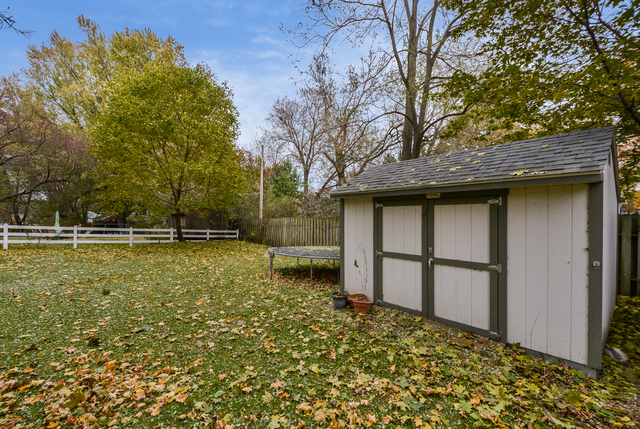 312 Main Street Oswego, IL 60543 - Photo 4 of 29 a view of a backyard
