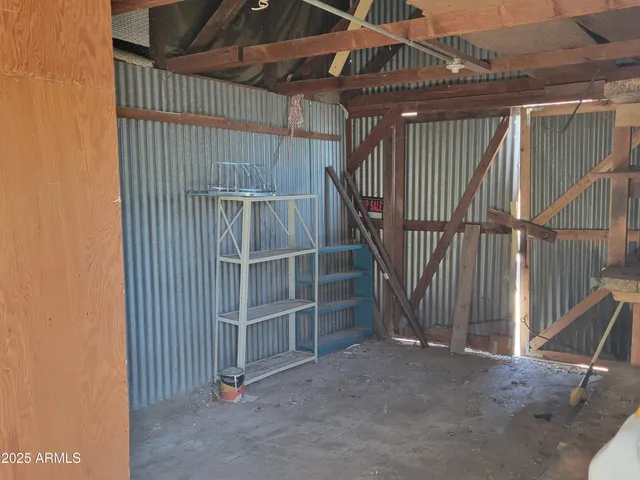 a view of an empty room with stairs
