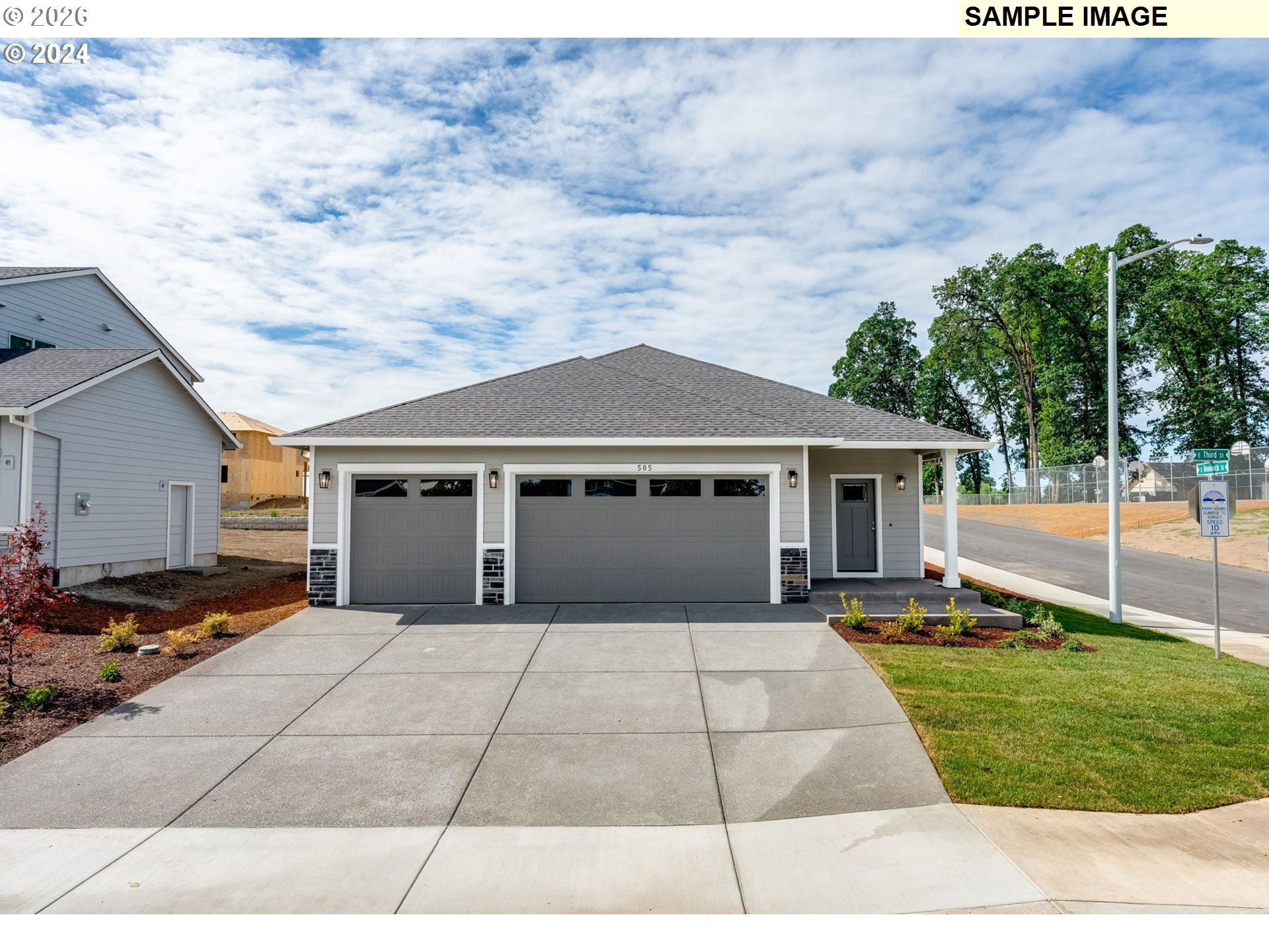 563 East Cleveland Street Carlton, OR 97111 - Photo 3 of 7 a front view of house with yard outdoor seating and barbeque oven