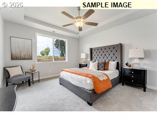 563 East Cleveland Street Carlton, OR 97111 - Photo 6 of 7 a bedroom with a bed and window