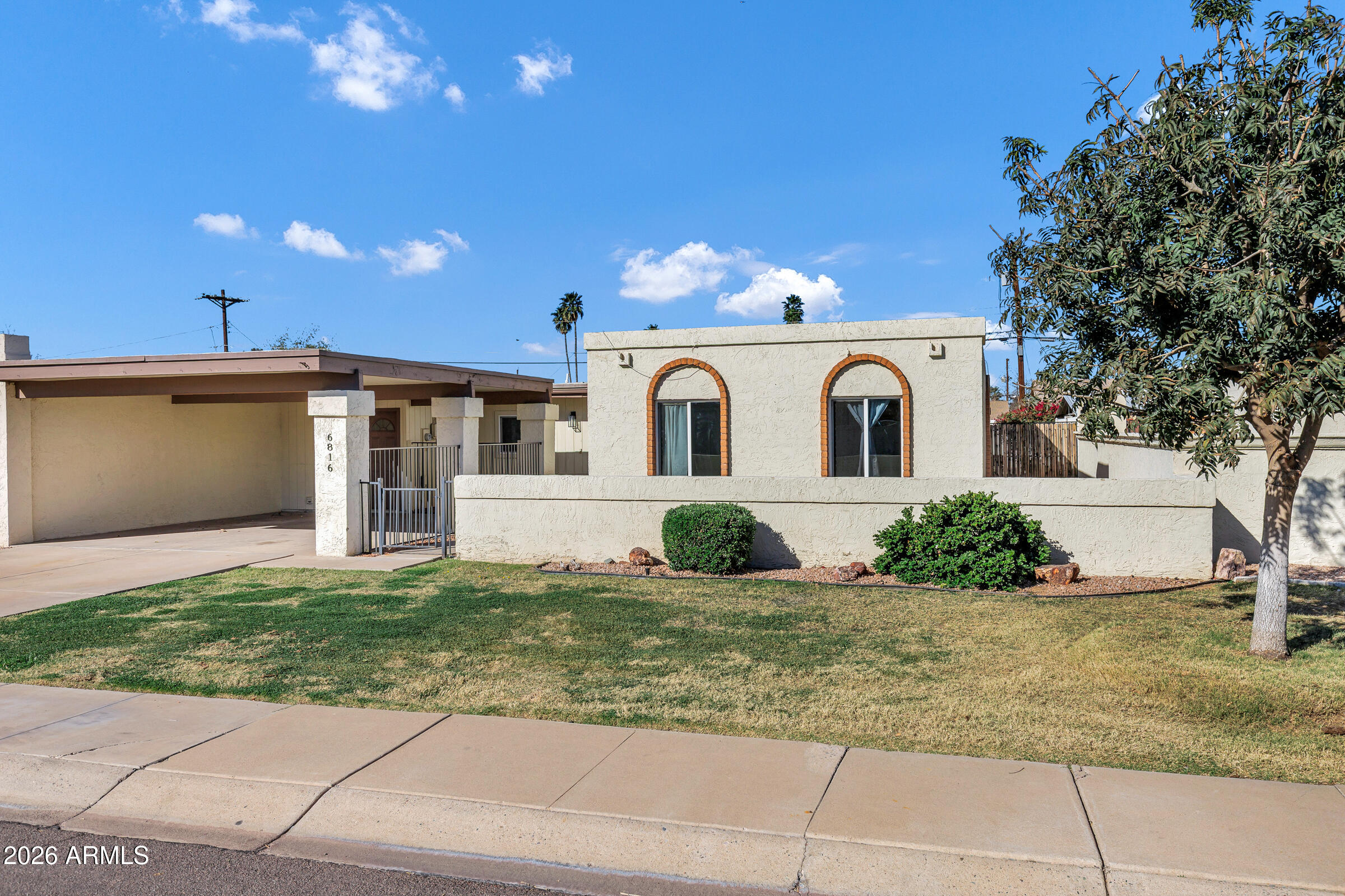 6816 North 29th Lane Phoenix, AZ 85017 - Photo 3 of 28 Front carport and courtyard