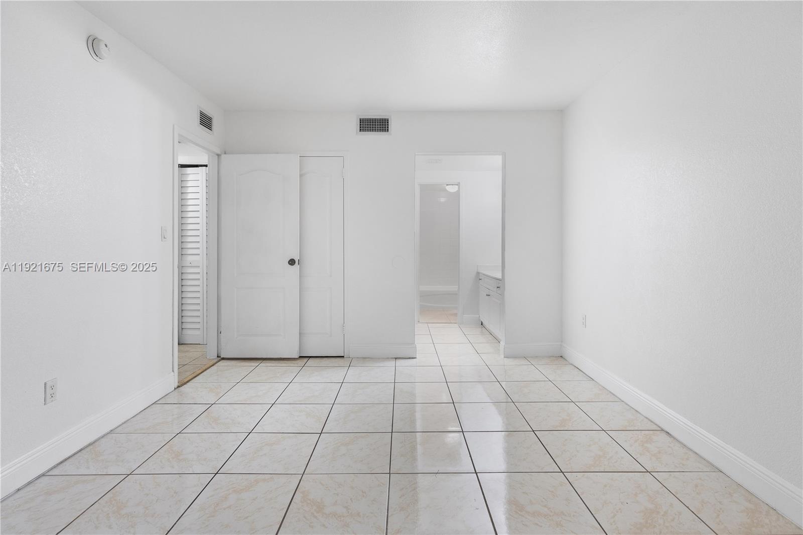 5102 Northwest 79th Avenue, Unit 304 Doral, FL 33166 - Photo 14 of 25 a view of an empty room