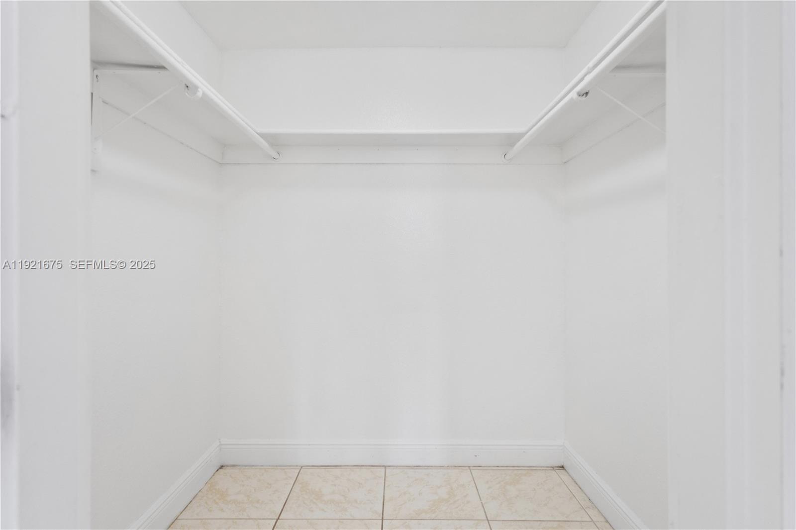 5102 Northwest 79th Avenue, Unit 304 Doral, FL 33166 - Photo 15 of 25 a view of a closet