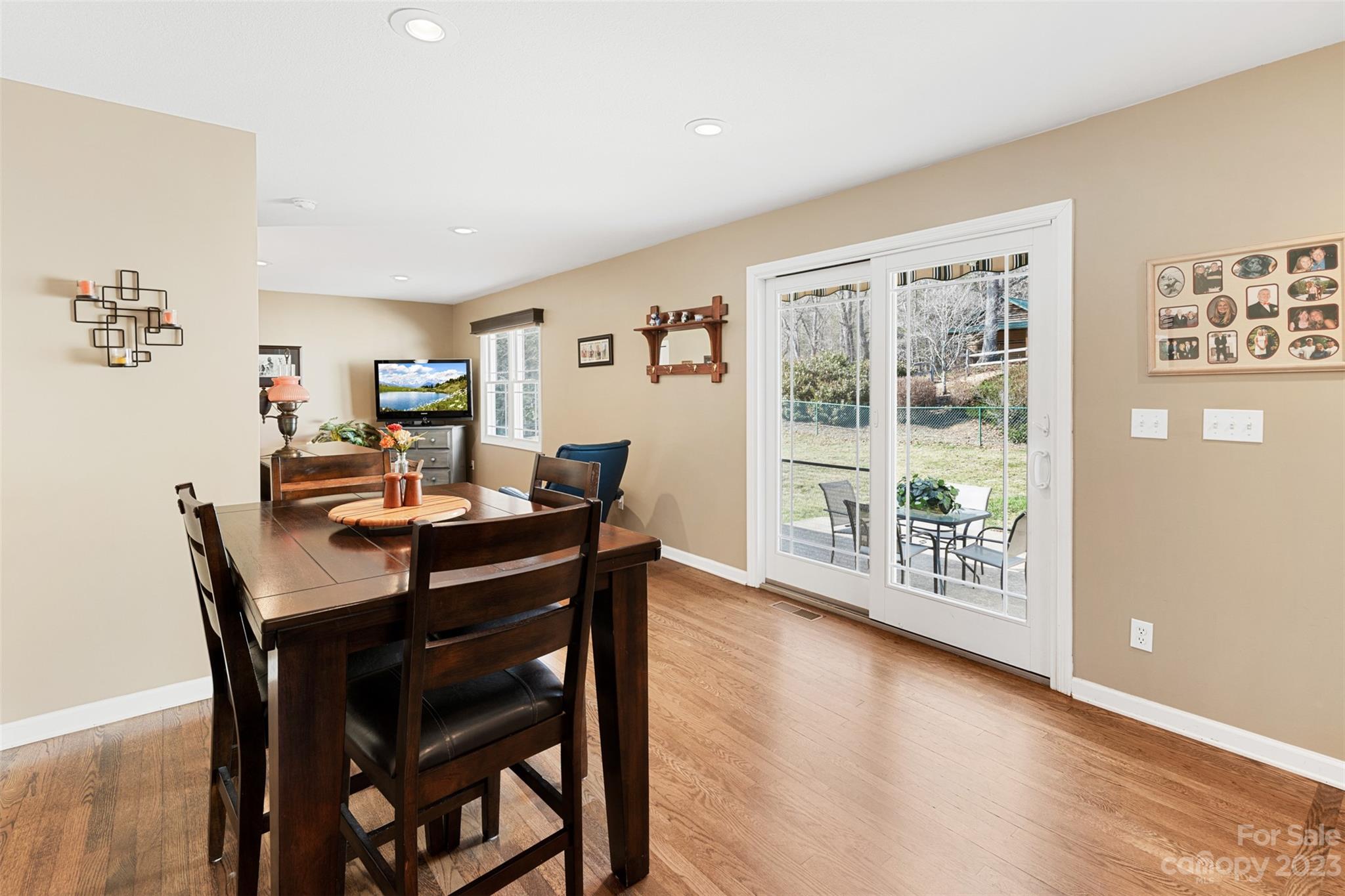 36 Wild Wind Trail Fairview, NC 28730 - Photo 15 of 33 a view of a dining room with furniture window and wooden floor