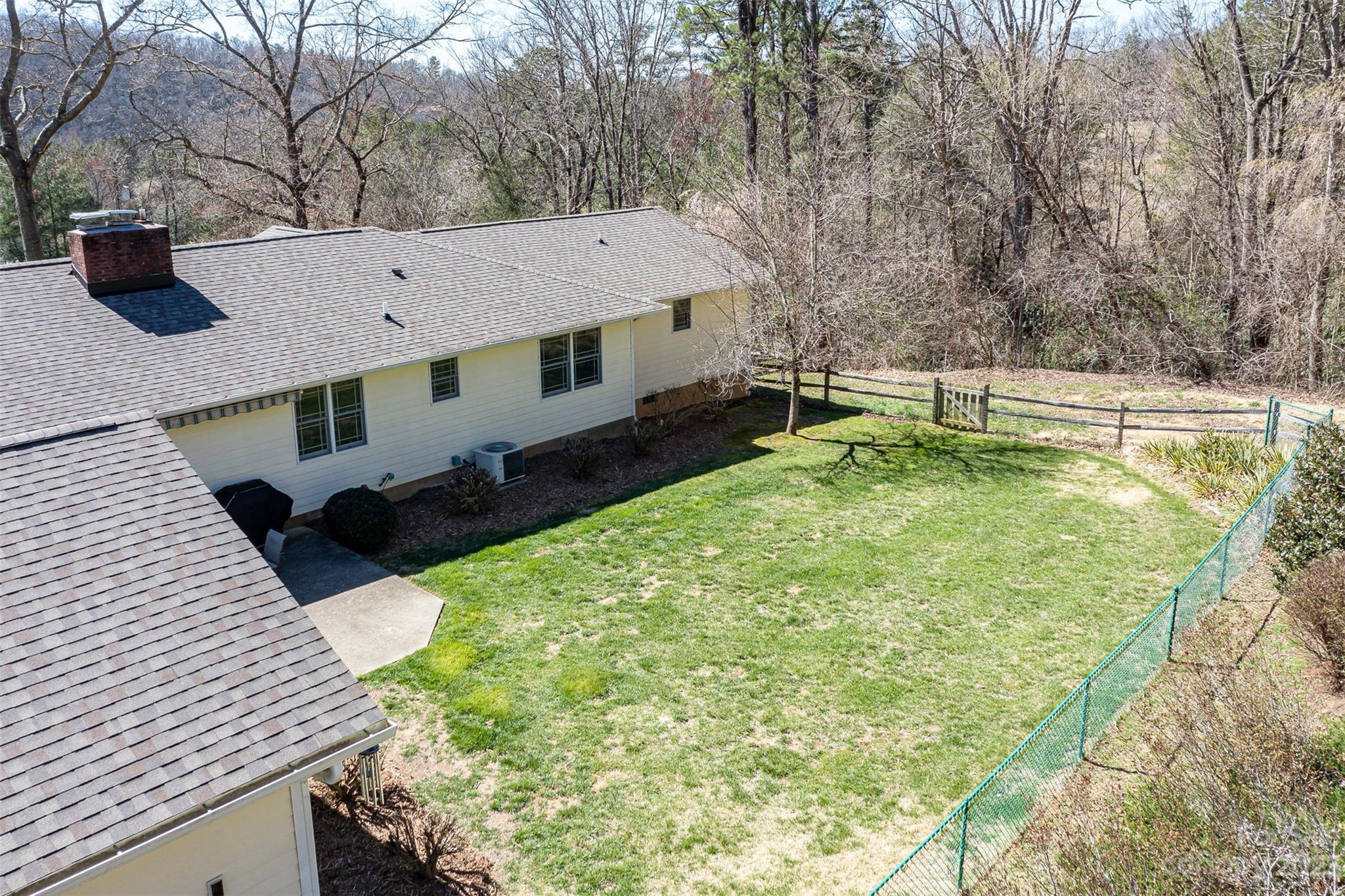 36 Wild Wind Trail Fairview, NC 28730 - Photo 21 of 33 a view of a house with a yard
