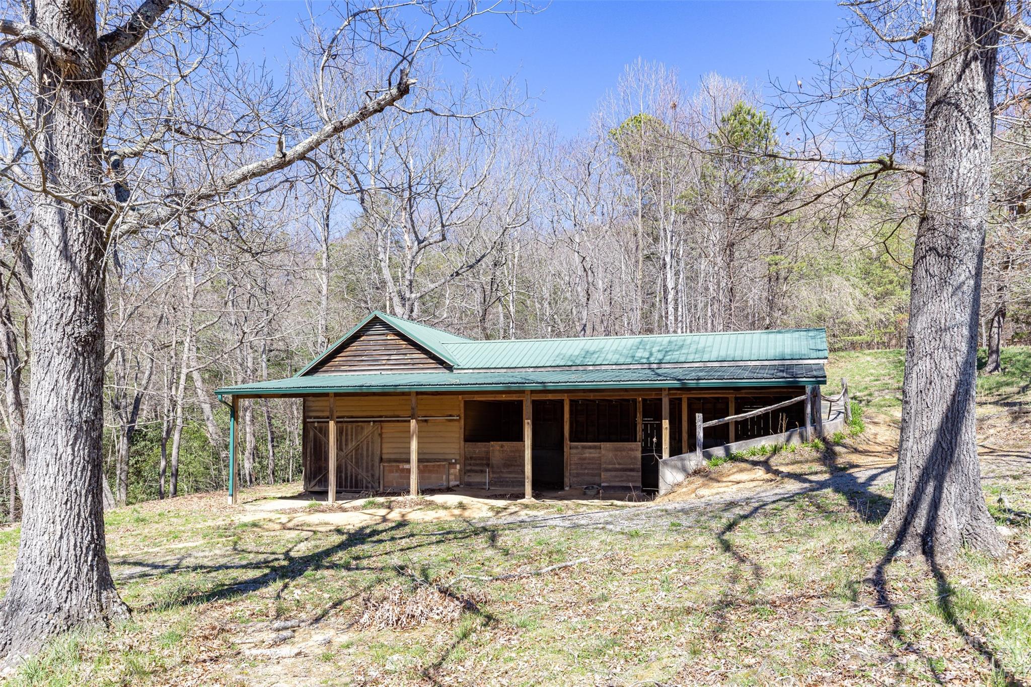 36 Wild Wind Trail Fairview, NC 28730 - Photo 24 of 33 a front view of a house with garden