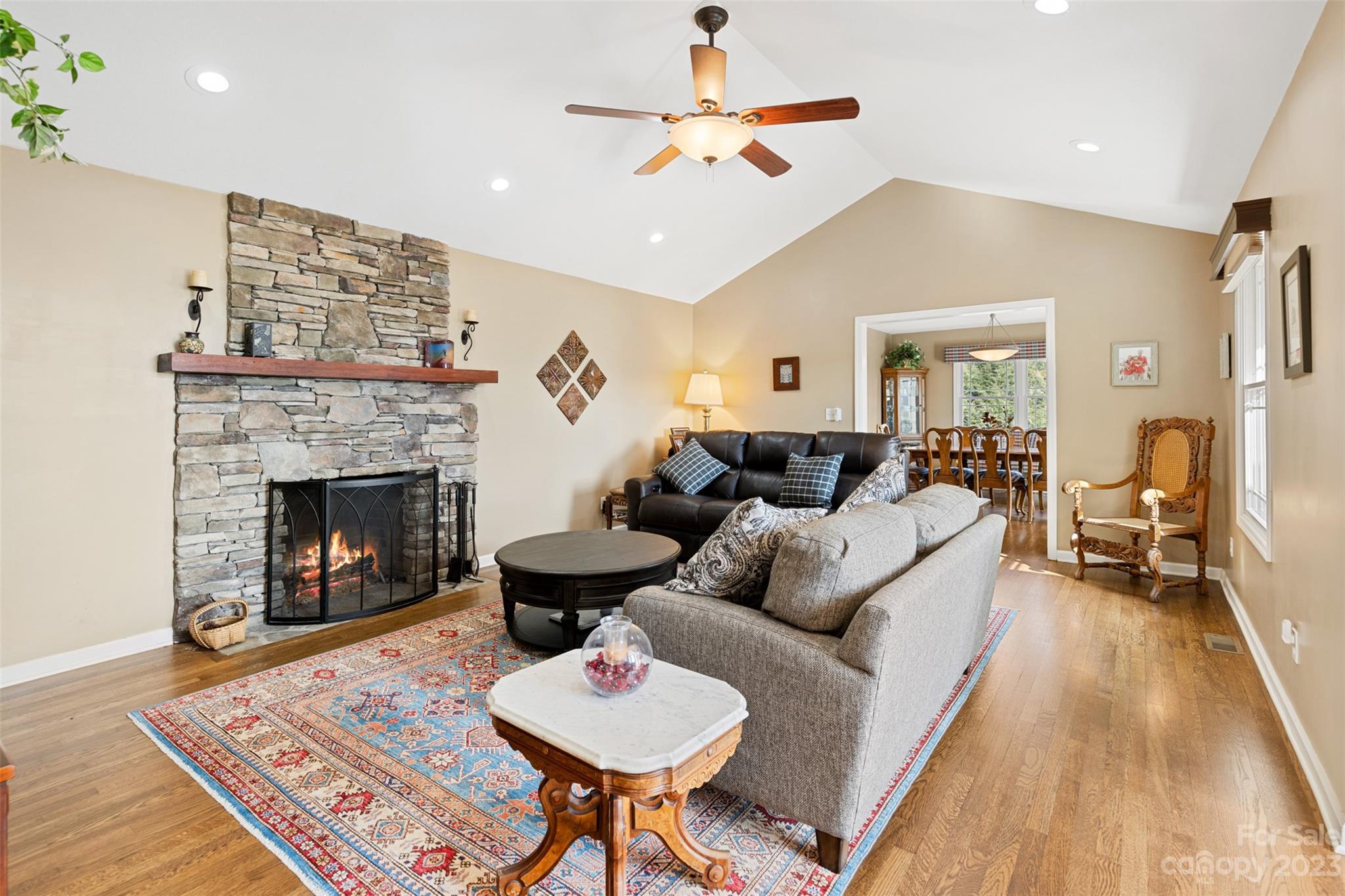 36 Wild Wind Trail Fairview, NC 28730 - Photo 9 of 33 a living room with furniture and a fireplace