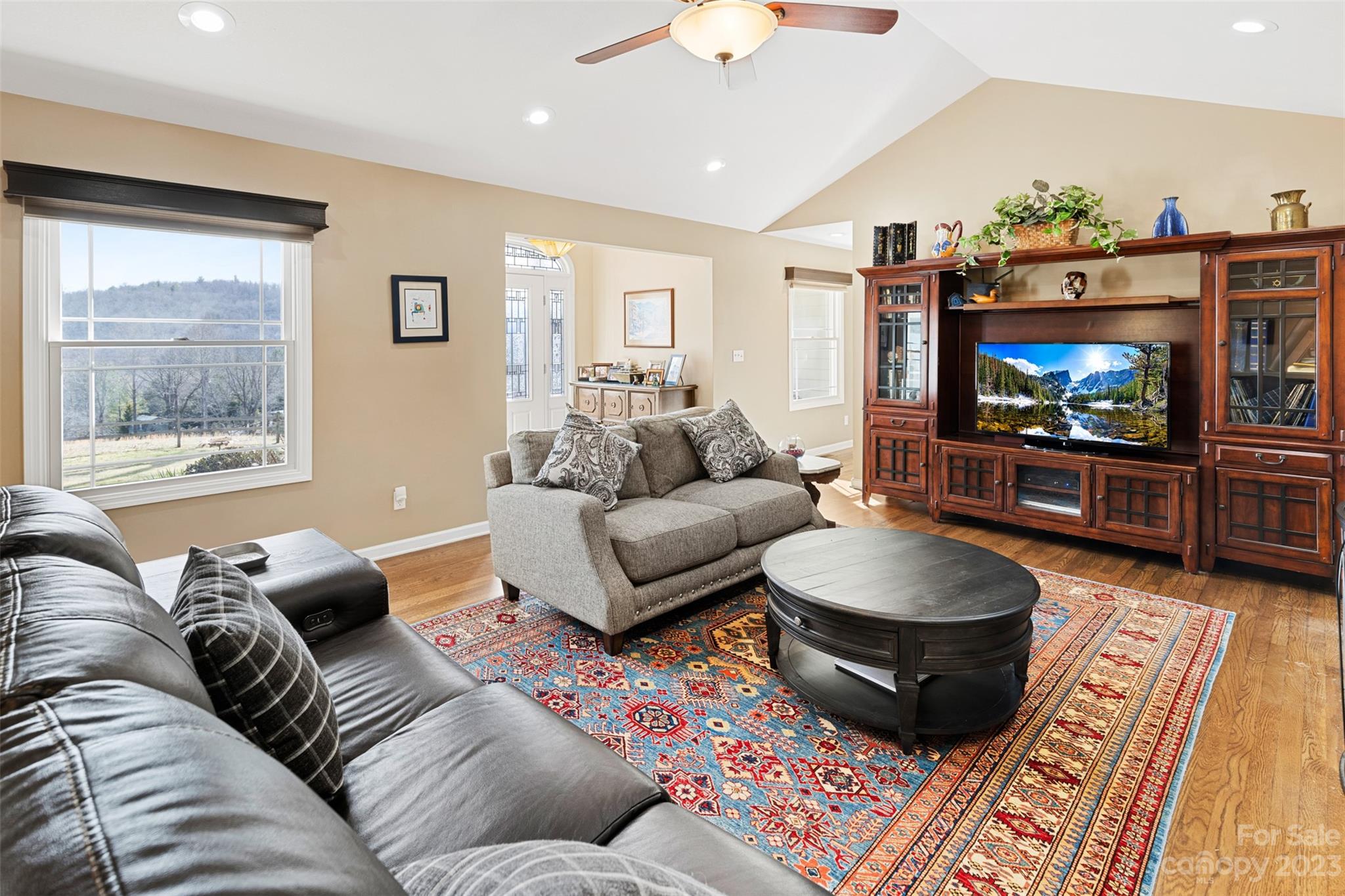 36 Wild Wind Trail Fairview, NC 28730 - Photo 10 of 33 a living room with furniture and a flat screen tv