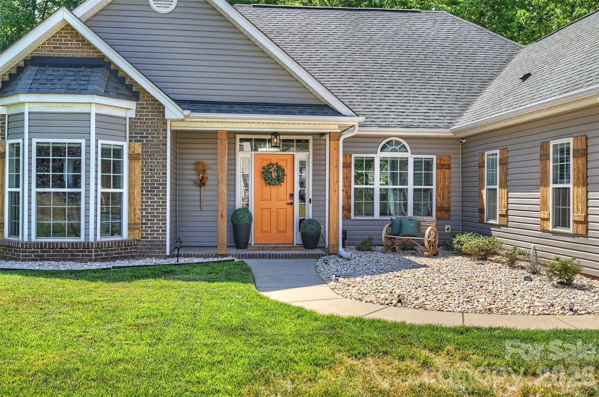 2500 Grayson Parkway Monroe, NC 28110 - Photo 3 of 41 a front view of a house with garden