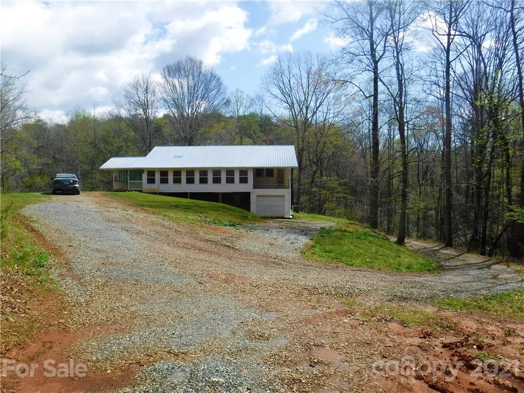 4221 Maple Creek Road Rutherfordton, NC 28139 - Photo 2 of 48 a view of a house with a yard and sitting area