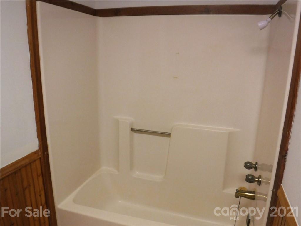 4221 Maple Creek Road Rutherfordton, NC 28139 - Photo 19 of 48 a bathroom with a bathtub