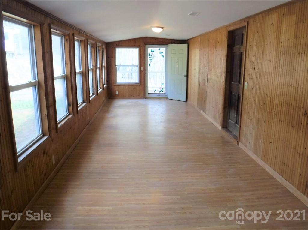 4221 Maple Creek Road Rutherfordton, NC 28139 - Photo 9 of 48 a view of entryway with stairs and wooden floor