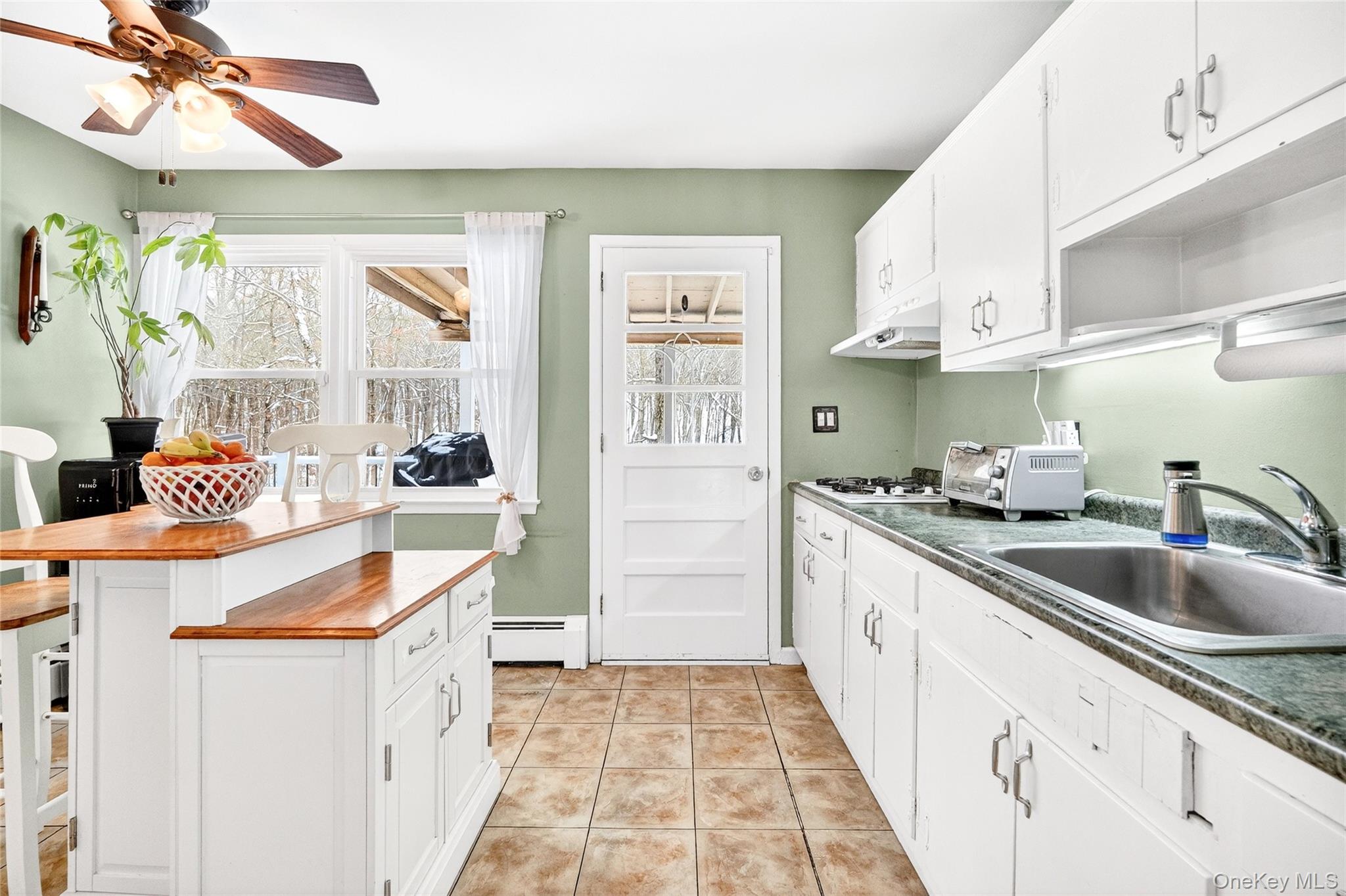 125 Cedar Flats Road Stony Point, NY 10980 - Photo 12 of 48 a kitchen with granite countertop a sink and cabinets