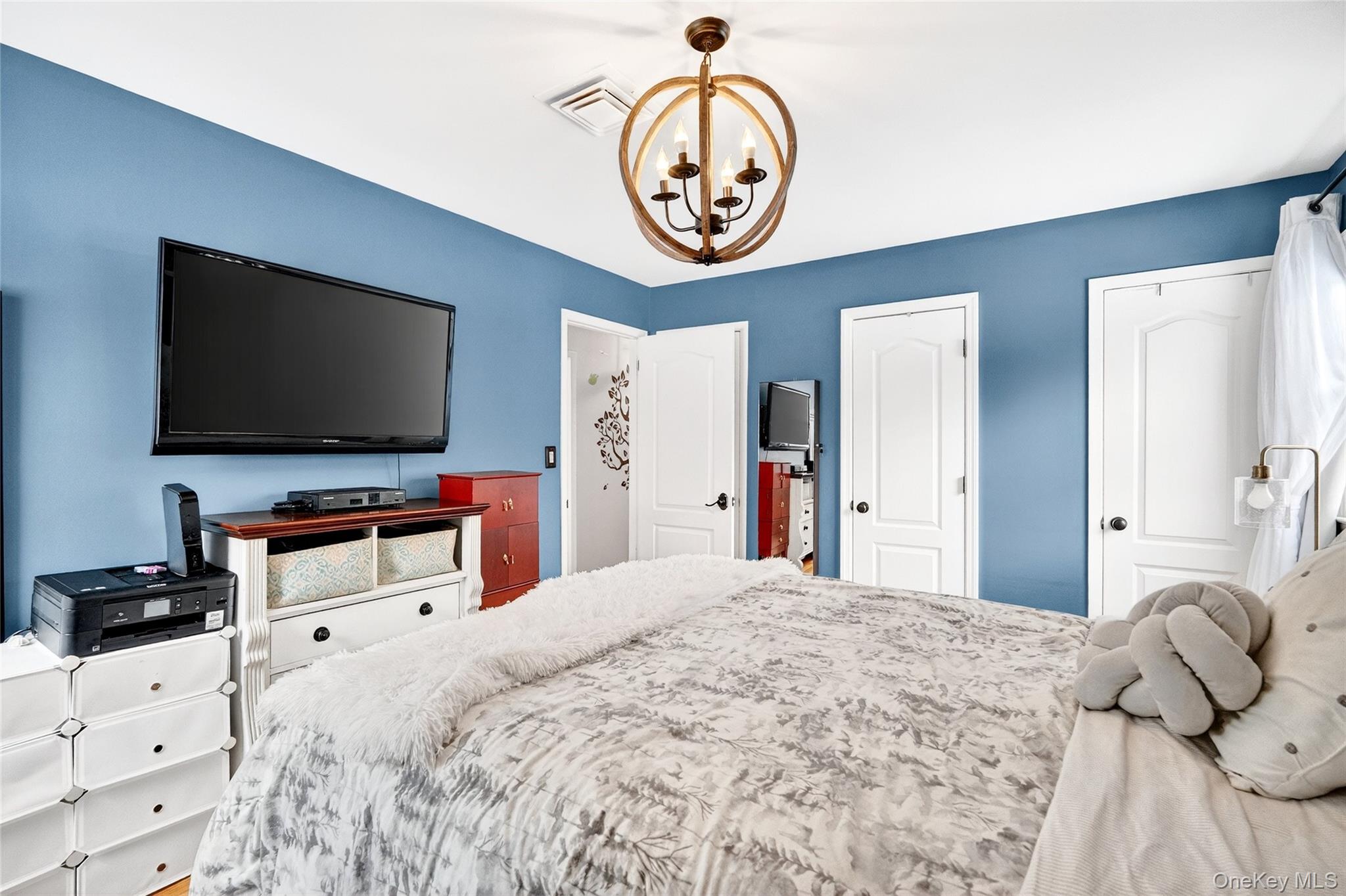 125 Cedar Flats Road Stony Point, NY 10980 - Photo 17 of 48 a bedroom with a bed and a television