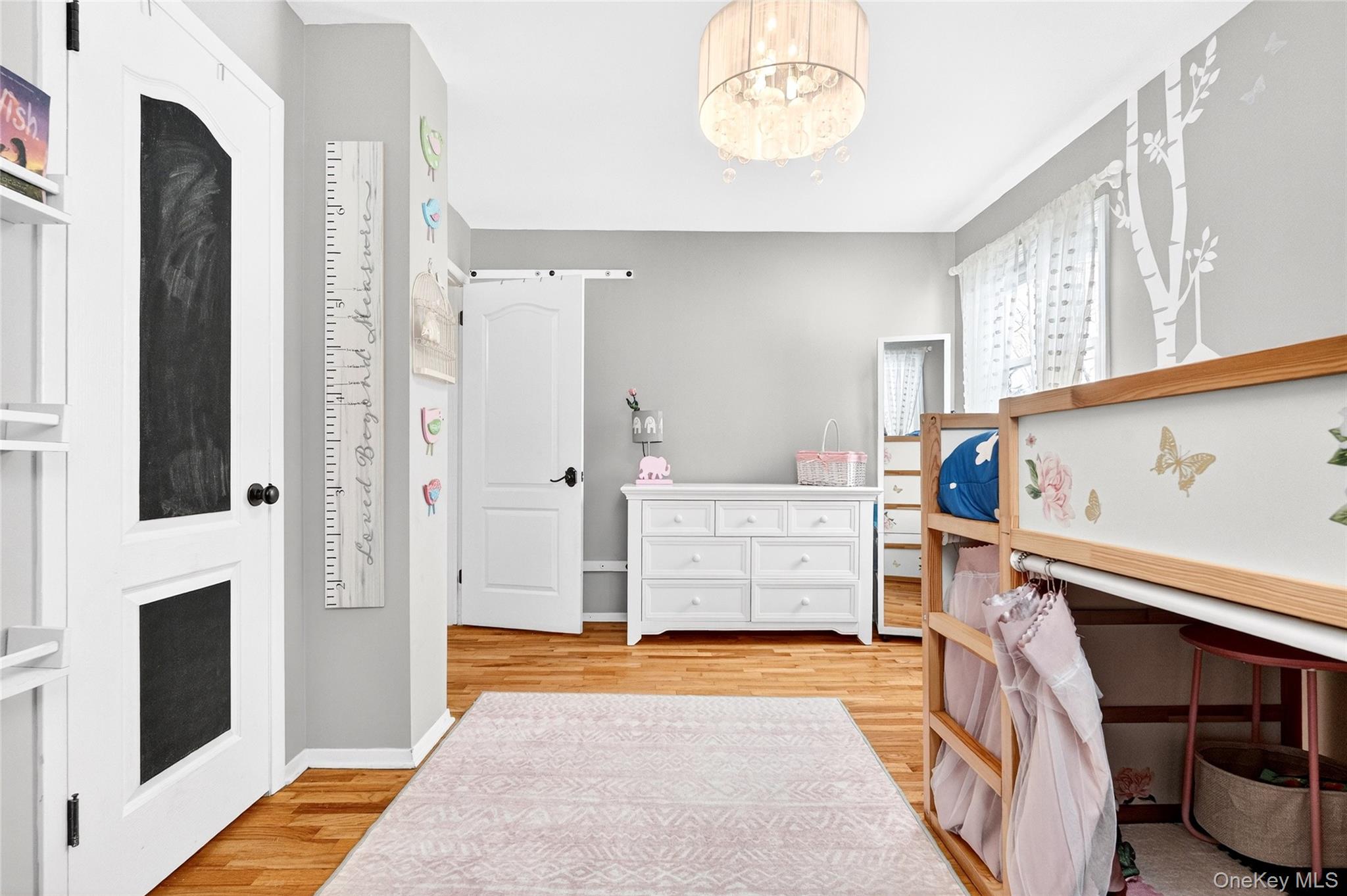 125 Cedar Flats Road Stony Point, NY 10980 - Photo 22 of 48 a bedroom with a bed and a fireplace