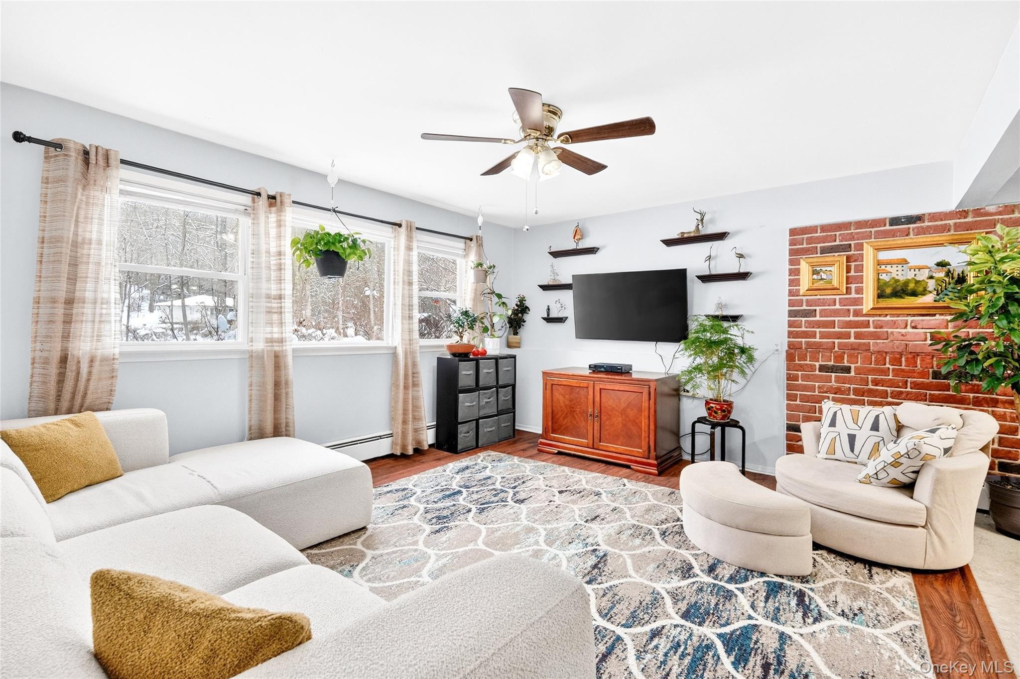 125 Cedar Flats Road Stony Point, NY 10980 - Photo 27 of 48 a living room with furniture and a large window
