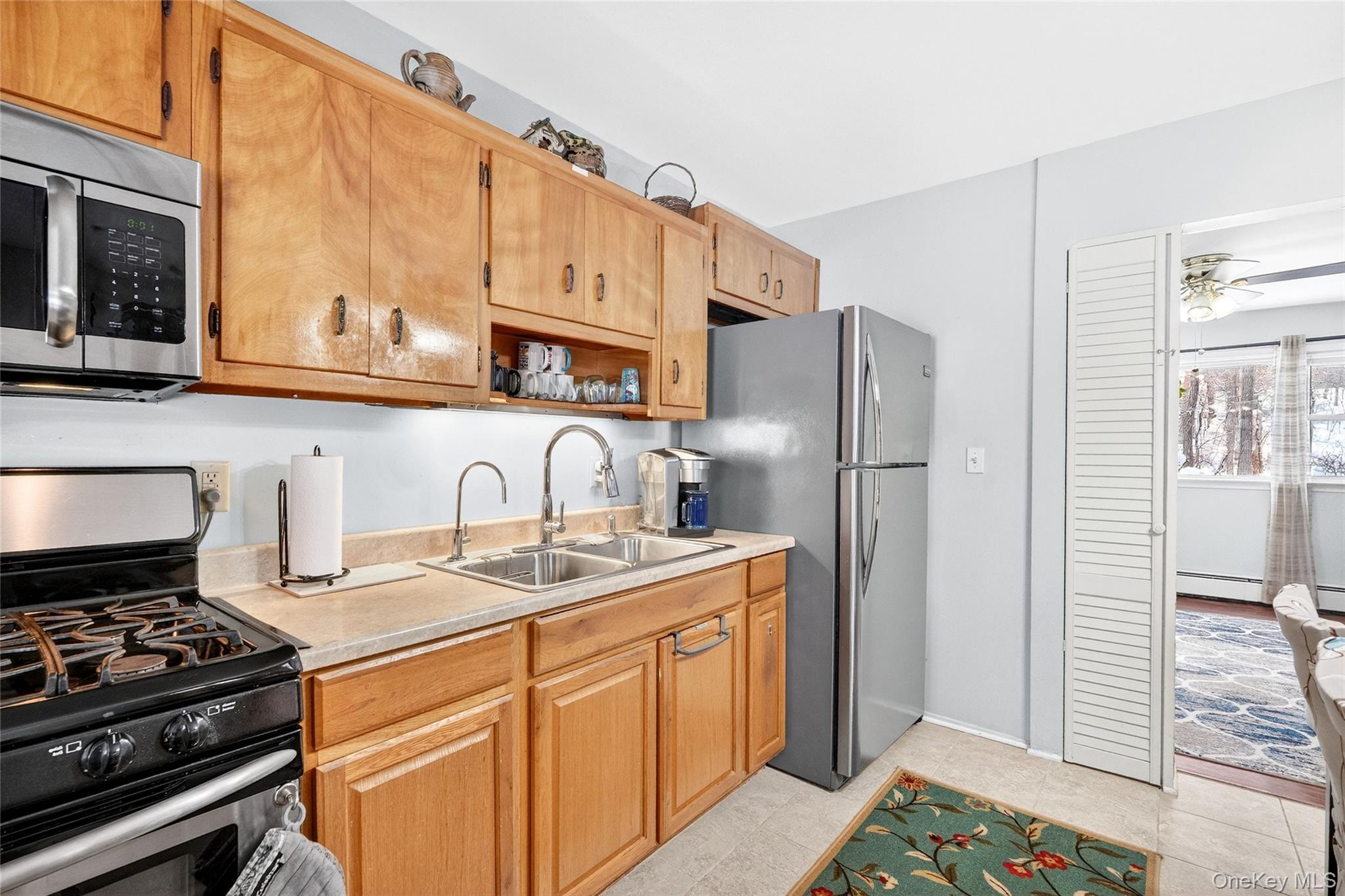 125 Cedar Flats Road Stony Point, NY 10980 - Photo 31 of 48 a kitchen with stainless steel appliances granite countertop a stove a refrigerator and a sink