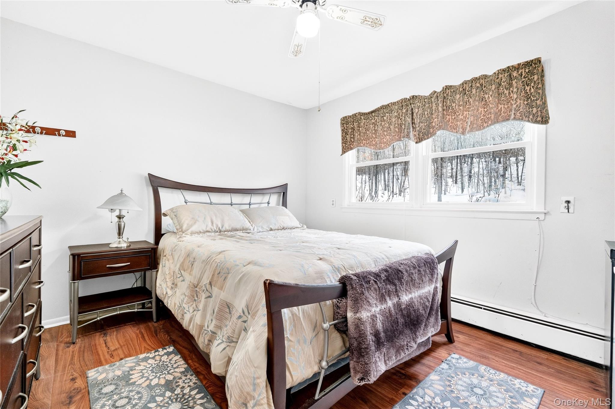 125 Cedar Flats Road Stony Point, NY 10980 - Photo 35 of 48 a bedroom with a bed table and two window