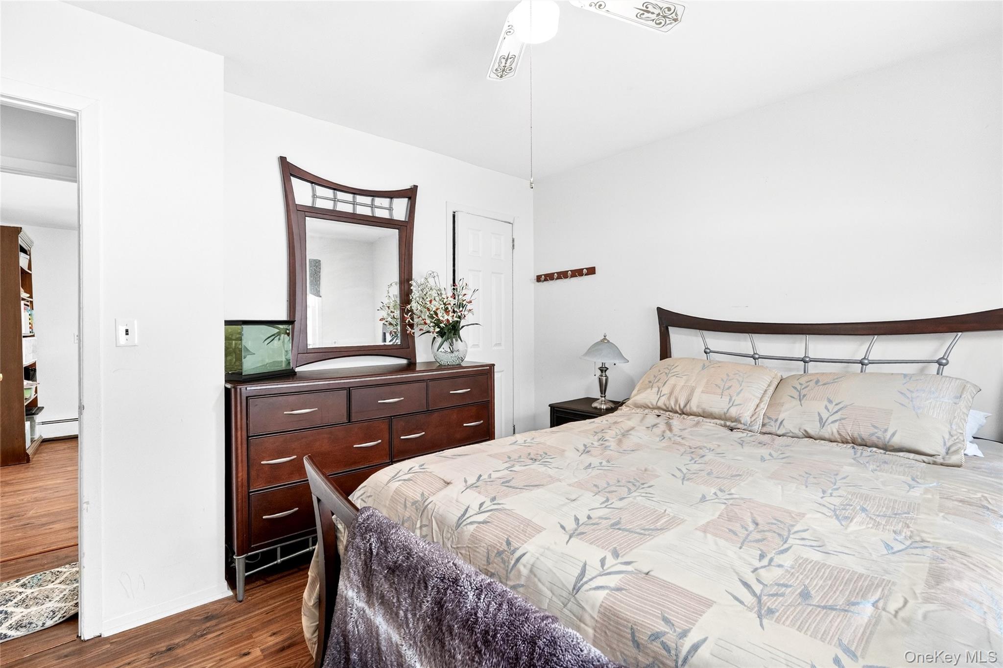 125 Cedar Flats Road Stony Point, NY 10980 - Photo 36 of 48 a bedroom with a bed and a mirror on dresser