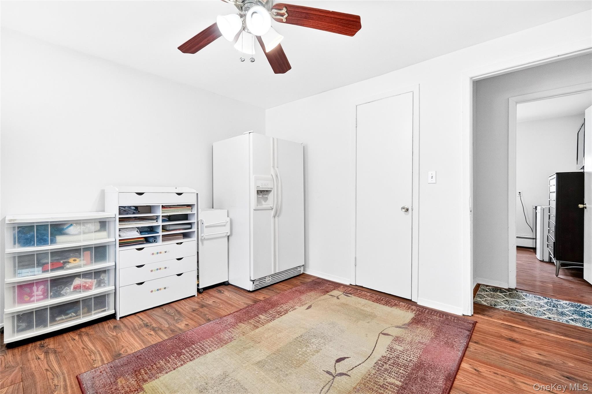 125 Cedar Flats Road Stony Point, NY 10980 - Photo 38 of 48 a view of a bedroom with cabinet and flat screen tv