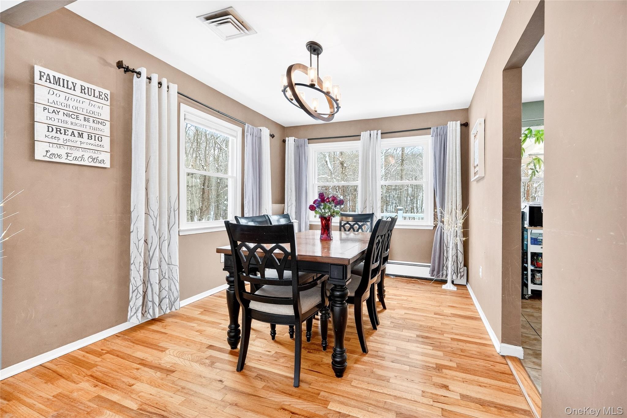 125 Cedar Flats Road Stony Point, NY 10980 - Photo 8 of 48 a view of a dining room with furniture window and wooden floor