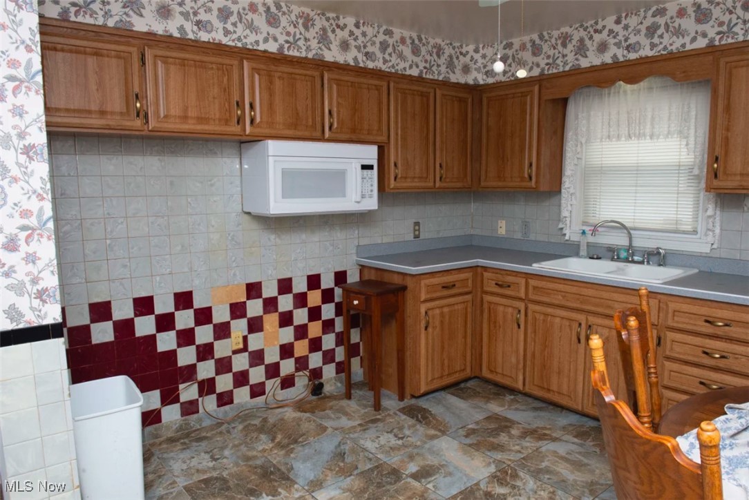 3123 South Meridian Road Youngstown, OH 44511 - Photo 6 of 20 Kitchen featuring sink