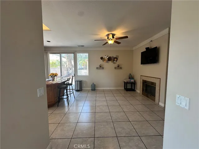 a view of a livingroom with furniture and a fireplace