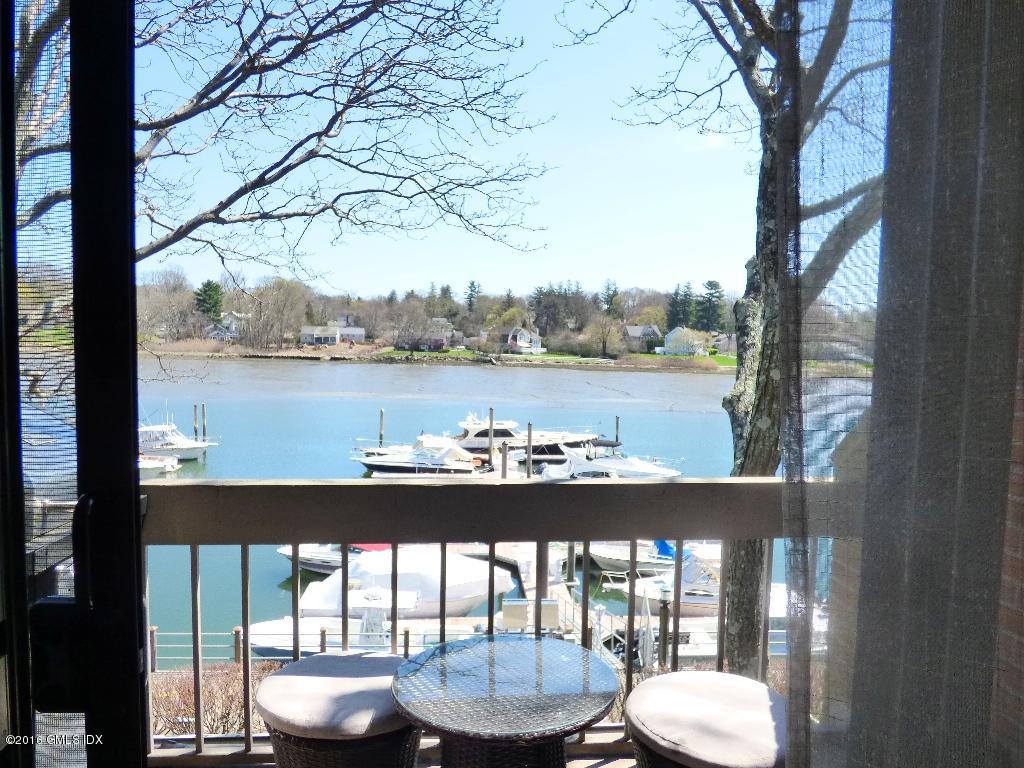 a view of a balcony with lake view and mountain view