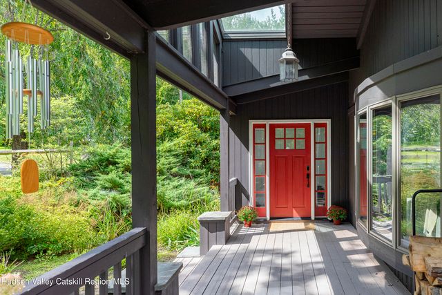 a view of porch with a swing chair