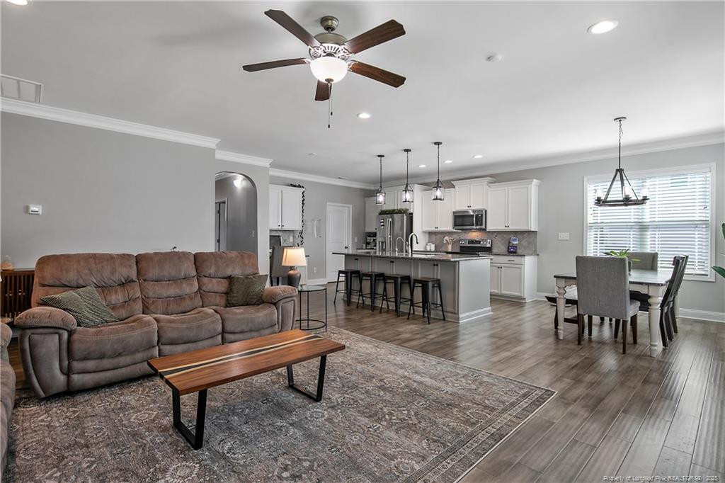2628 Riddle Farm Road Fayetteville, NC 28306 - Photo 13 of 50 a living room with furniture and kitchen view