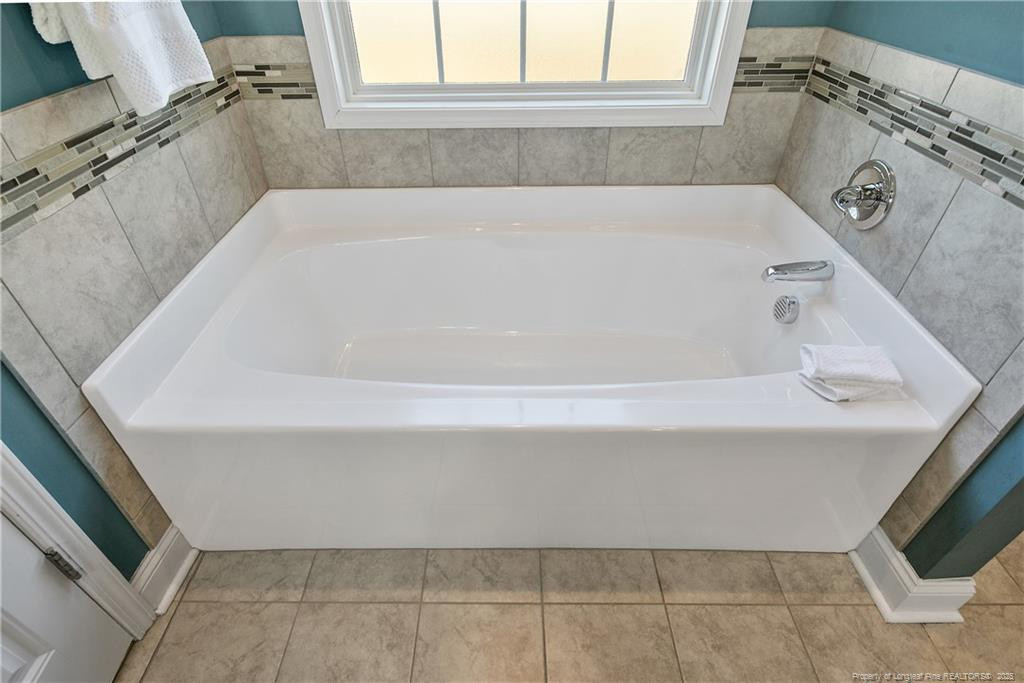 2628 Riddle Farm Road Fayetteville, NC 28306 - Photo 32 of 50 a bathroom with a bathtub