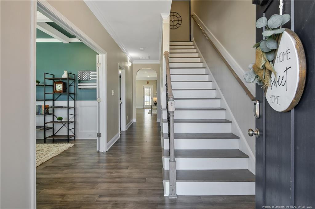 2628 Riddle Farm Road Fayetteville, NC 28306 - Photo 6 of 50 a view of a hallway with wooden floor and entryway