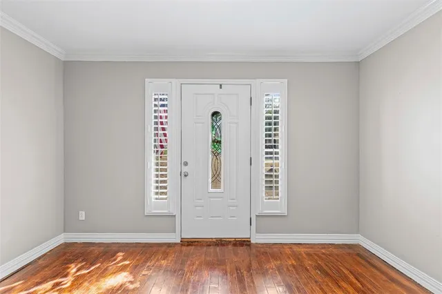 a view of an empty room with closet