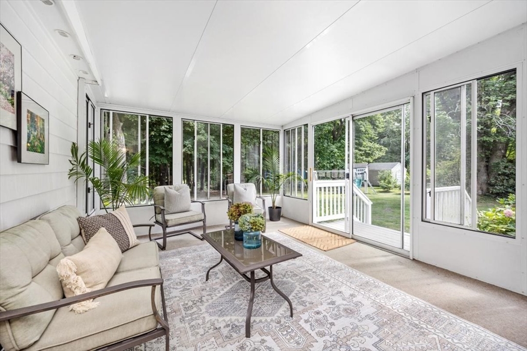 150 High Street Norwell, MA 02061 - Photo 15 of 39 a living room with furniture and windows