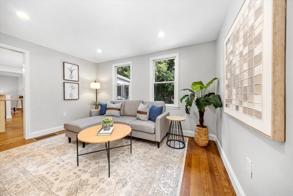 150 High Street Norwell, MA 02061 - Photo 17 of 39 a living room with furniture and a large window