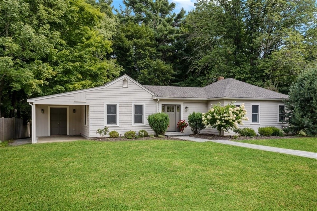 150 High Street Norwell, MA 02061 - Photo 2 of 39 a front view of a house with yard and green space