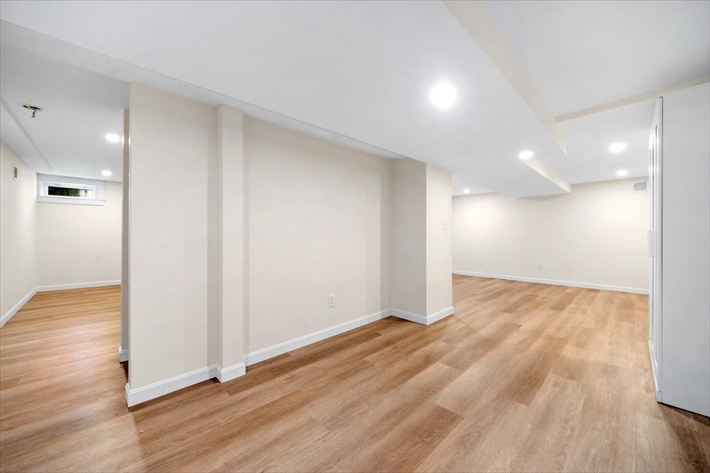 150 High Street Norwell, MA 02061 - Photo 24 of 39 a view of an empty room and wooden floor