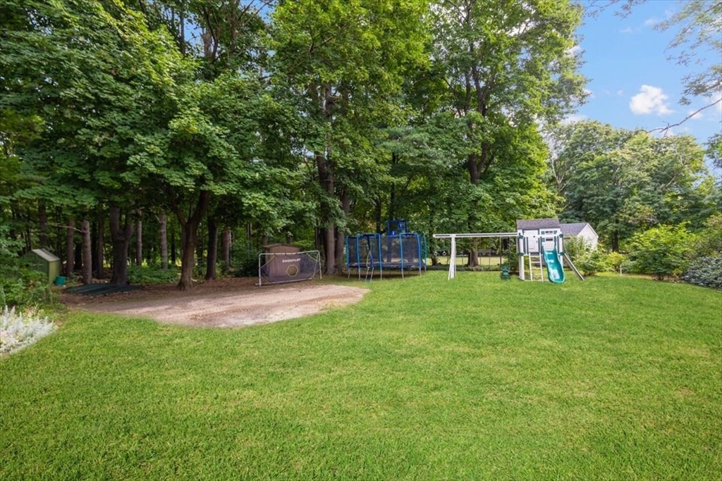 150 High Street Norwell, MA 02061 - Photo 34 of 39 a view of a house with backyard and sitting area