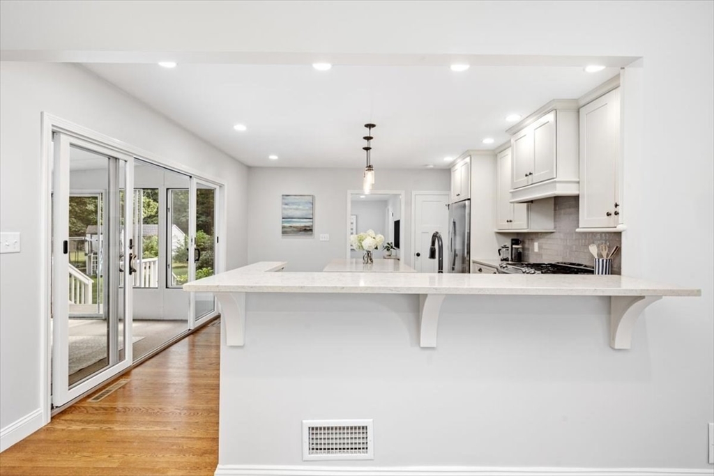 150 High Street Norwell, MA 02061 - Photo 9 of 39 a large kitchen with stainless steel appliances a large window