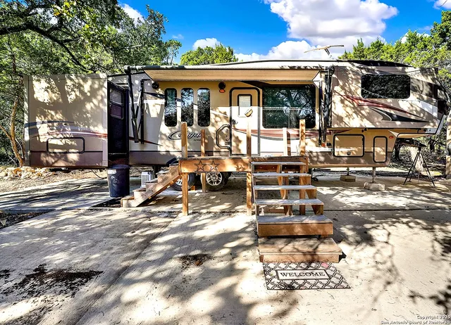 a view of a chairs and tables in patio
